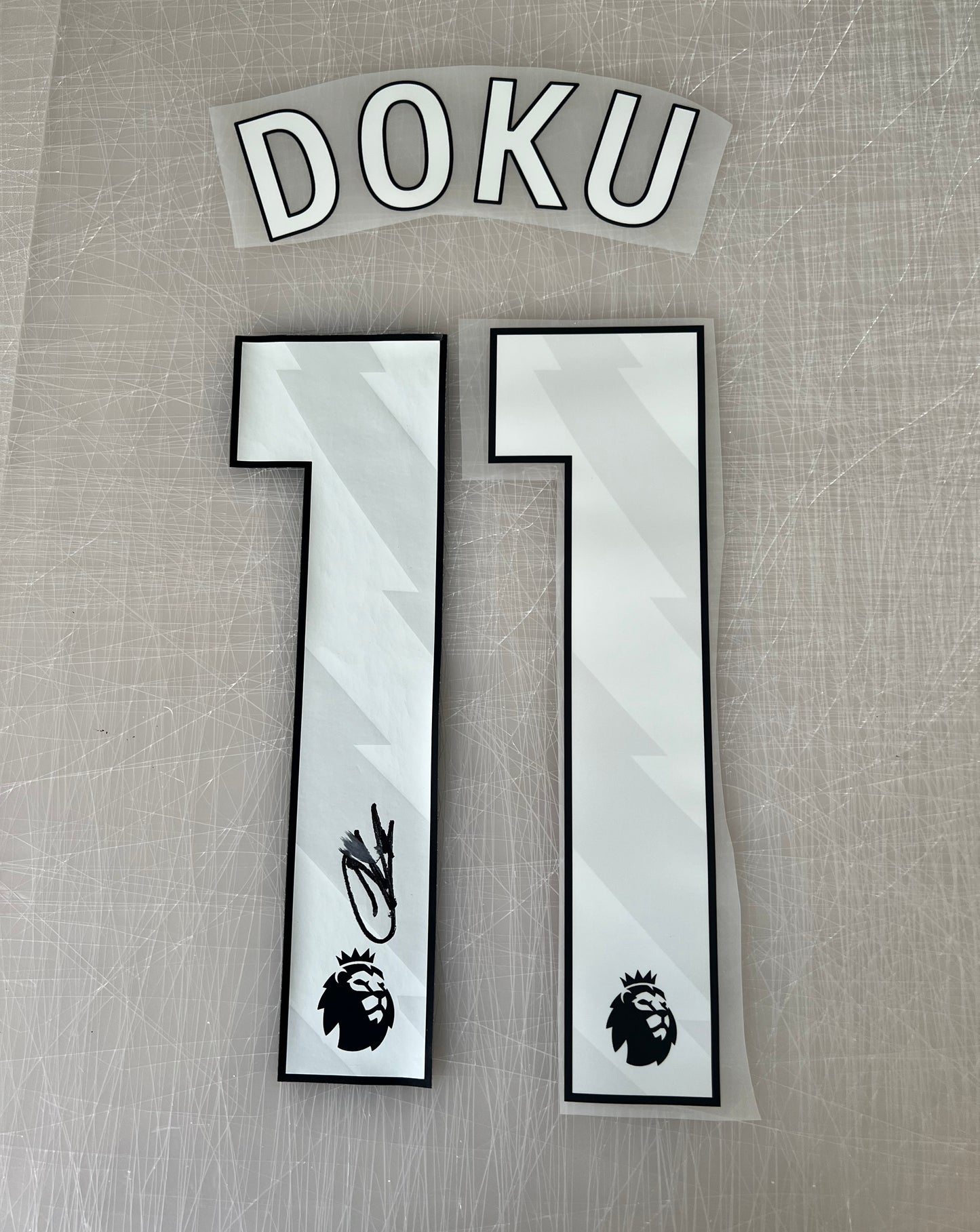 Jeremy Doku Signed number/shirt